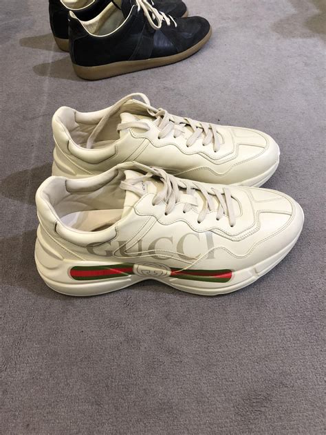 rhyton gucci sneakers replica|Gucci rhyton distressed sneakers.